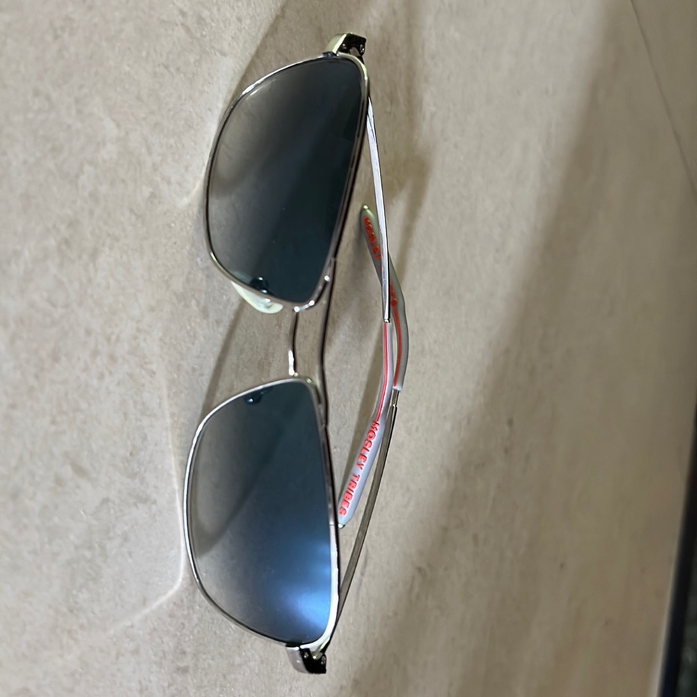 Mosley Tribes sunglasses. Good condition. One nose pad missing.